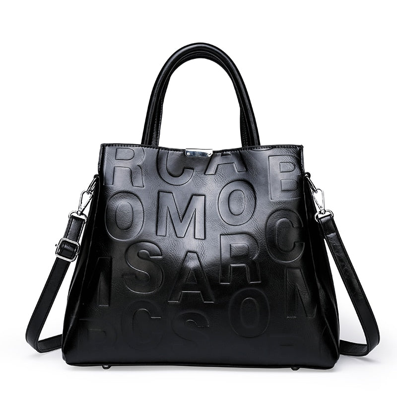 Kayla Letter Embossed Trapeze Bag - 4 Colors